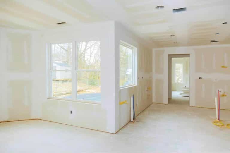 Should Plasterboard Touch the Floor?