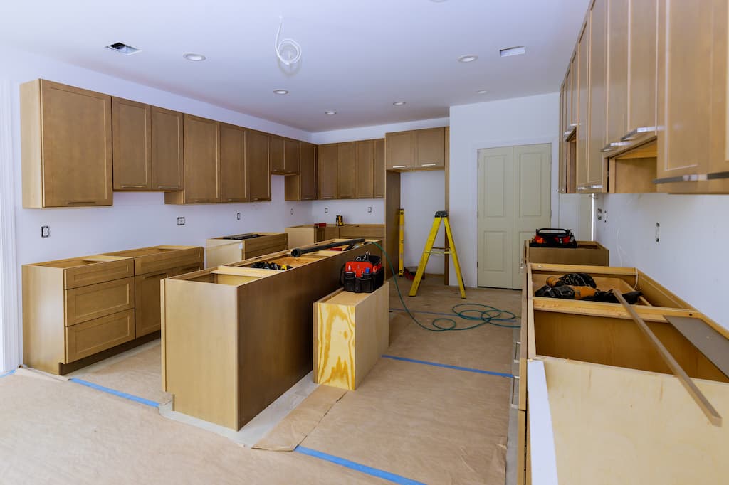 Can Kitchen Cabinets Be Installed Before The Flooring